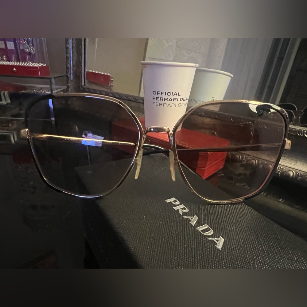 Prada Women's Sunglasses with Gold Frame